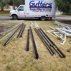 gutters laying on ground