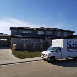 Treasure Valley Gutters truck in front of resident