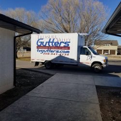 treasure valley gutters truck parked on street